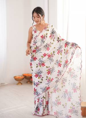 Garb These Party Wear Saree in Fine Colored.These Saree Are Chinon And Blouse is Chinon Fabricated.Its Beautified With Designer Digital Printed With Mirror Cut Work Border.