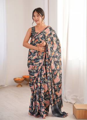 Garb These Party Wear Saree in Fine Colored.These Saree Are Chinon And Blouse is Chinon Fabricated.Its Beautified With Designer Digital Printed With Mirror Cut Work Border.