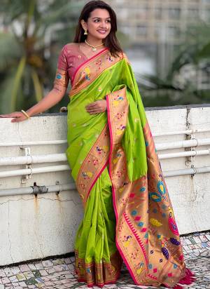 Looking These Party Wear Saree in Fine Colored.These Saree And Blouse is Fabricated On Soft Silk.Its Beautified With Weaving Meenakari Paithani Designer.