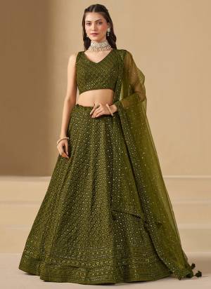 For A Designer Look,Grab These Party Wear Lehenga Choli in Fine Colored.These Lehenga And Blouse Are Fabricated On Georgette Pair With Dupatta Are Soft Net.Its Beautified With Thread,Sequance Embroidery Work.