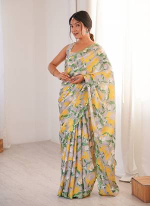 Garb These Party Wear Saree in Fine Colored.These Saree Are Chinon And Blouse is Chinon Fabricated.Its Beautified With Designer Digital Printed With Mirror Cut Work Border.