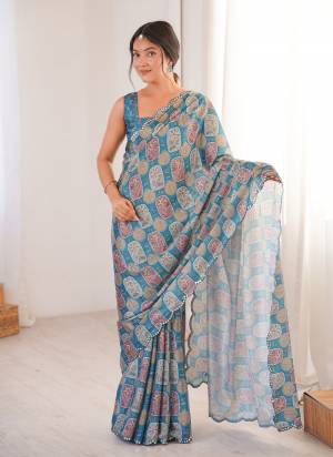 Garb These Party Wear Saree in Fine Colored.These Saree Are Chinon And Blouse is Chinon Fabricated.Its Beautified With Designer Digital Printed With Mirror Cut Work Border.
