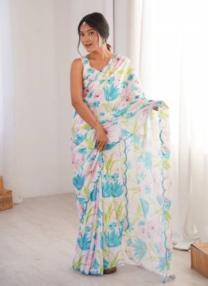 Garb These Party Wear Saree in Fine Colored.These Saree Are Chinon And Blouse is Chinon Fabricated.Its Beautified With Designer Digital Printed With Mirror Cut Work Border.