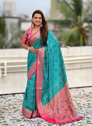 Attractive These Party Wear Saree in Fine Colored.These Saree And Blouse is Fabricated On Patola Silk.Its Beautified With Weaving Meenakari Bandhani Designer.