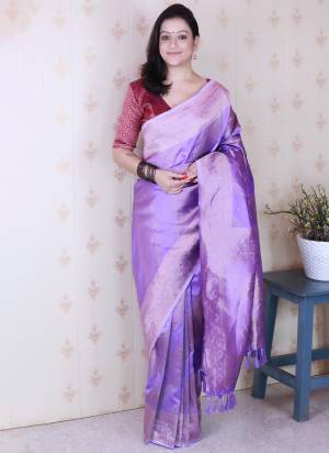 Looking These Party Wear Saree in Fine Colored.These Saree And Blouse is Fabricated On Soft Silk.Its Beautified With Weaving Laheriya Gold Jari Designer.