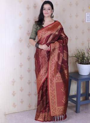 Looking These Party Wear Saree in Fine Colored.These Saree And Blouse is Fabricated On Soft Silk.Its Beautified With Weaving Laheriya Gold Jari Designer.