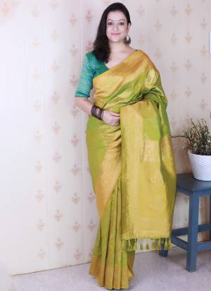 Looking These Party Wear Saree in Fine Colored.These Saree And Blouse is Fabricated On Soft Silk.Its Beautified With Weaving Laheriya Gold Jari Designer.