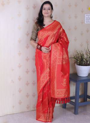 Looking These Party Wear Saree in Fine Colored.These Saree And Blouse is Fabricated On Soft Silk.Its Beautified With Weaving Laheriya Gold Jari Designer.