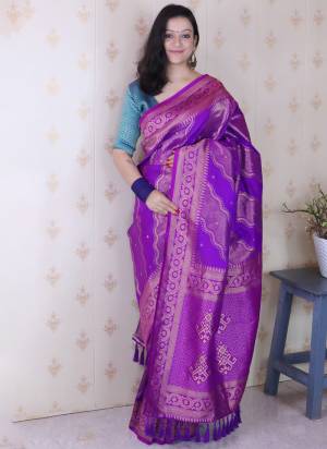 Looking These Party Wear Saree in Fine Colored.These Saree And Blouse is Fabricated On Soft Silk.Its Beautified With Weaving Laheriya Gold Jari Designer.