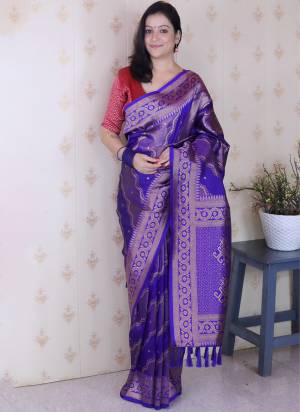 Looking These Party Wear Saree in Fine Colored.These Saree And Blouse is Fabricated On Soft Silk.Its Beautified With Weaving Laheriya Gold Jari Designer.