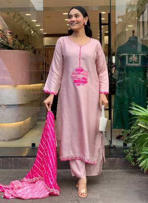 Garb These Suit in Fine Colored Pair With Bottom And Dupatta.These Top Are Silk Blend And Bottom Are Fabricated On Silk Blend Pair With Muslin Dupatta.Its Beautified With Designer Embroidery Work.