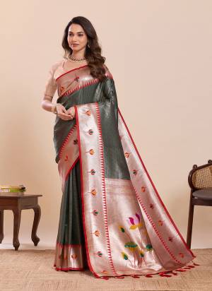 Garb This Party Wear Saree Paired With Blouse.This Saree And Blouse Are Soft Silk Fabric With Woven Paithani Meenakari Designer. Buy This Pretty Saree Now.