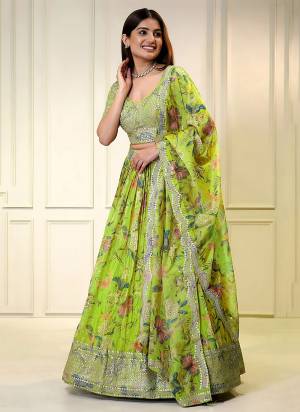 For A Designer Look,Grab These Lehenga Choli in Fine Colored.These Lehenga And Blouse Are Fabricated On Organza Pair With Dupatta Are Organza.Its Beautified With Digital Floral Printed Designer With Sequance Embroidery Work.