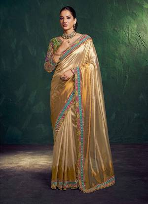 Look Attractive These Designer Party Wear Fancy Saree With Stitched Blouse in Fine Colored.These Saree Are Kanjivaram Jari Tissue Silk And Blouse Netural Upada Silk Fabricated.Its Beautified Fancy Designer Embroidery, Hand Work.