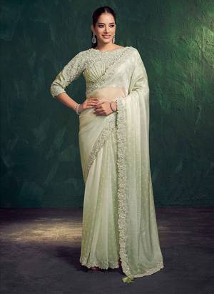 Look Attractive These Designer Party Wear Fancy Saree With Stitched Blouse in Fine Colored.These Saree Are Two Tone Shaded And Blouse Two Tone Satin Silk Fabricated.Its Beautified Fancy Designer Embroidery, Hand Work.