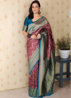 Looking These Party Wear Saree in Fine Colored.These Saree And Blouse is Fabricated On Banarasi Silk.Its Beautified With Weaving Gold Jari Designer.