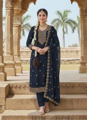 Garb These Disigner Suit in Fine Colored Pair With Bottom And Dupatta.These Top Are Georgette And Dupatta Are Fabricated On Georgette Pair With Santoon Bottom.Its Beautified With Designer Embroidery,Swarovski Work.