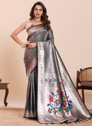 Garb This Party Wear Saree Paired With Blouse.This Saree And Blouse Are Soft Silk Fabric With Woven Paithani Meenakari Designer. Buy This Pretty Saree Now.