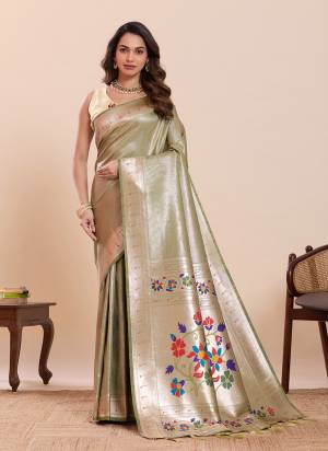 Garb This Party Wear Saree Paired With Blouse.This Saree And Blouse Are Soft Silk Fabric With Woven Paithani Meenakari Designer. Buy This Pretty Saree Now.