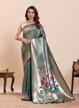 Garb This Party Wear Saree Paired With Blouse.This Saree And Blouse Are Soft Silk Fabric With Woven Paithani Meenakari Designer. Buy This Pretty Saree Now.