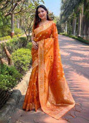 Looking These Party Wear Saree in Fine Colored.These Saree And Blouse is Fabricated On Organza.Its Beautified With Weaving Floral Designer.