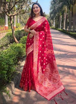 Looking These Party Wear Saree in Fine Colored.These Saree And Blouse is Fabricated On Organza.Its Beautified With Weaving Floral Designer.