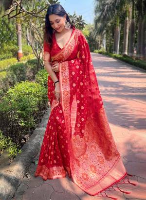 Looking These Party Wear Saree in Fine Colored.These Saree And Blouse is Fabricated On Organza.Its Beautified With Weaving Floral Designer.