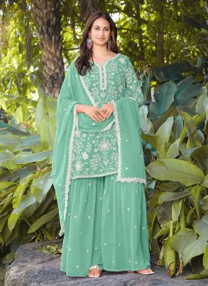Garb These Beautiful Party Wear Looking Readymade Sharara Suits.These Top And Bottom Are Georgette And Georgette Dupatta Fabricated.Its Beautified  With Disigner Embroidery,Beads Work.