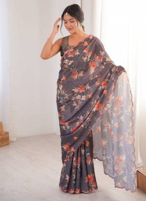 Attractive These Party Wear Saree in Fine Colored.These Saree Are Chinon And Blouse is Chinon Fabricated.Its Beautified With Designer Digital Printed With Mirror Cut Work Border.