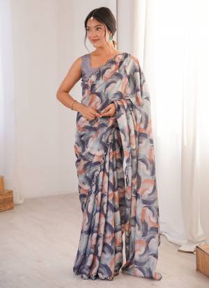 Attractive These Party Wear Saree in Fine Colored.These Saree Are Chinon And Blouse is Chinon Fabricated.Its Beautified With Designer Digital Printed With Mirror Cut Work Border.