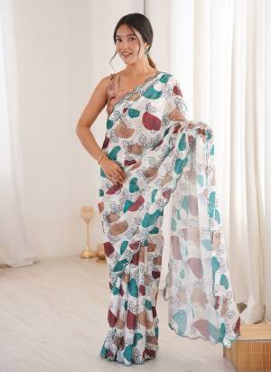 Attractive These Party Wear Saree in Fine Colored.These Saree Are Chinon And Blouse is Chinon Fabricated.Its Beautified With Designer Digital Printed With Mirror Cut Work Border.