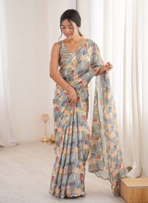 Attractive These Party Wear Saree in Fine Colored.These Saree Are Chinon And Blouse is Chinon Fabricated.Its Beautified With Designer Digital Printed With Mirror Cut Work Border.