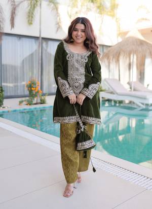 Attactive These Beautiful Looking Readymade Suit With Dupatta.These Top And Dupatta Are Velvet And Dupatta is Fabricated On Lajri.Its Beautified With Designer Coding,Jari Embroidery Work.