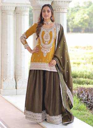 Attactive These Beautiful Looking Readymade Suit With Dupatta.These Top Bottom And Dupatta is Fabricated On NC Silk.Its Beautified With Designer Codding,Sequance Embroidery Work.