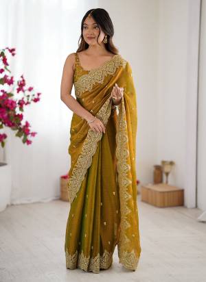 Attractive These Fancy Party Wear Saree in Fine Two Tone Colored.These Saree Are Fendy Chiffon And Blouse is Satin Silk Fabricated.Its Beautified With Two Tone Color,Designer Sequance,Jari Embroidery Work.