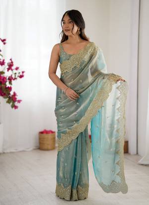 Attractive These Fancy Party Wear Saree in Fine Two Tone Colored.These Saree Are Fendy Chiffon And Blouse is Satin Silk Fabricated.Its Beautified With Two Tone Color,Designer Sequance,Jari Embroidery Work.