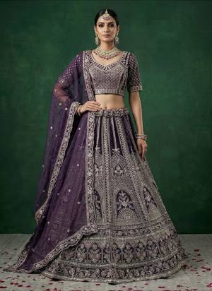 For A Fancy Designer Look,Grab These Lehenga Choli With Dupatta in Fine Colored.These Lehenga And Choli Are Satin And Dupatta Are Fabricated On Satin Pair.Its Beautified With Fancy Dori, Sequance Embroidery,Crystal Pipe Hand Work. 