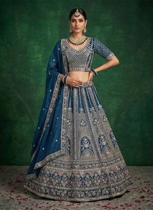 For A Fancy Designer Look,Grab These Lehenga Choli With Dupatta in Fine Colored.These Lehenga And Choli Are Satin And Dupatta Are Fabricated On Satin Pair.Its Beautified With Fancy Dori, Sequance Embroidery,Crystal Pipe Hand Work. 