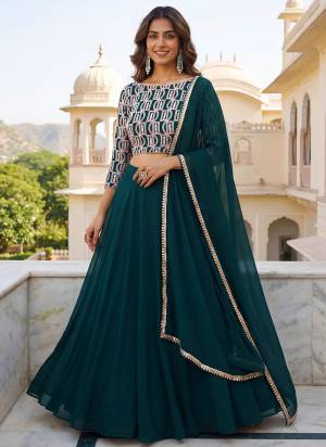 For A Designer Look,Grab These Lehenga Choli in Fine Colored.These Lehenga And Blouse Are Fabricated On Georgette Pair With Dupatta Are Georgette.Its Beautified With Designer Thread,Jari,Sequance Embroidery Work.