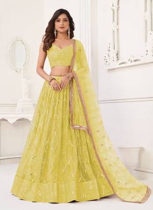 For A Different Look,Grab These Party Wear Designer Lehenga in All Over Pretty Colored Pair With Blouse And Dupatta.These Lehenga Choli And Dupatta is All Over Butterfly Net Base Fabric With Designer Cotton Thread,Sequance Embroidery Work.