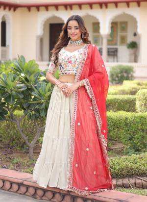 Looking These Party Wear Lehenga Choli in Fine Colored. These Lehenga And Blouse Are Cosmos Silk And Dupatta Are Fabricated On Tabby Silk Fabriced. It is Beautified With Designer Jari,Multy Thread Embroidery Work.