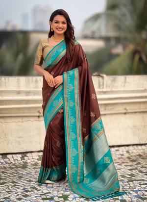 Looking These Party Wear Saree in Fine Colored.These Saree And Blouse is Fabricated On Soft Silk.Its Beautified With Weaving Rangoli Art Jari Designer.