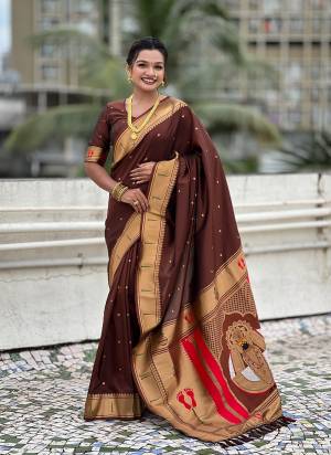 Looking These Party Wear Saree in Fine Colored.These Saree And Blouse is Fabricated On Soft Silk.Its Beautified With Weaving Rich Paithani Pallu Designer.