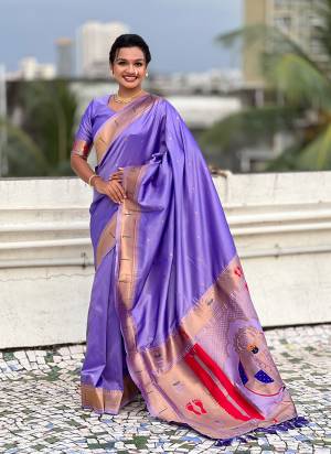 Looking These Party Wear Saree in Fine Colored.These Saree And Blouse is Fabricated On Soft Silk.Its Beautified With Weaving Rich Paithani Pallu Designer.
