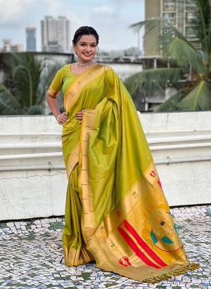 Looking These Party Wear Saree in Fine Colored.These Saree And Blouse is Fabricated On Soft Silk.Its Beautified With Weaving Rich Paithani Pallu Designer.