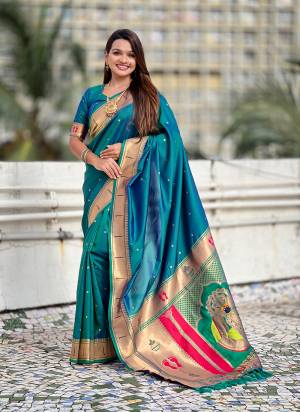 Looking These Party Wear Saree in Fine Colored.These Saree And Blouse is Fabricated On Soft Silk.Its Beautified With Weaving Rich Paithani Pallu Designer.