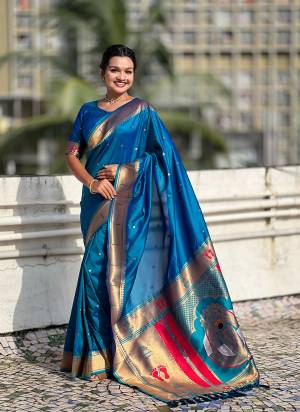 Looking These Party Wear Saree in Fine Colored.These Saree And Blouse is Fabricated On Soft Silk.Its Beautified With Weaving Rich Paithani Pallu Designer.