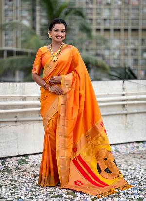 Looking These Party Wear Saree in Fine Colored.These Saree And Blouse is Fabricated On Soft Silk.Its Beautified With Weaving Rich Paithani Pallu Designer.