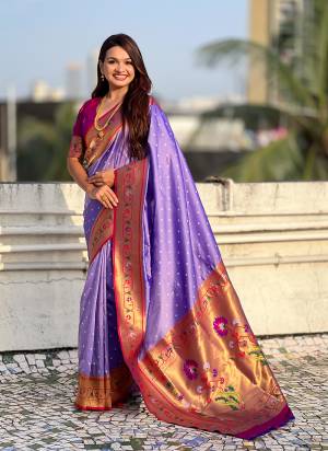 Garb These Party Wear Saree in Fine Colored.These Saree And Blouse is Fabricated On Soft Silk.Its Beautified With Weaving Bandhani Jari, Rich Paithani Meenakari Pallu Designer.