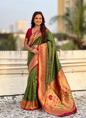 Garb These Party Wear Saree in Fine Colored.These Saree And Blouse is Fabricated On Soft Silk.Its Beautified With Weaving Bandhani Jari, Rich Paithani Meenakari Pallu Designer.
